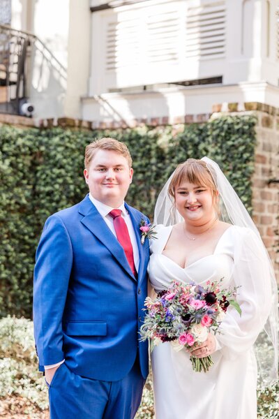 A whimsical portrait of Abbie + Trey after their elopement ceremony at Forsyth Park in Savannah, captured as part of our Savannah Elopement Package.