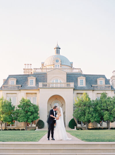 Wedding photography of bride and groom at outside at The Olana in Dallas, Texas