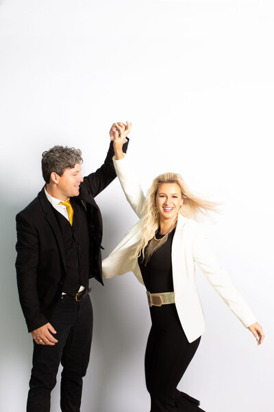 Robert twirling Amy