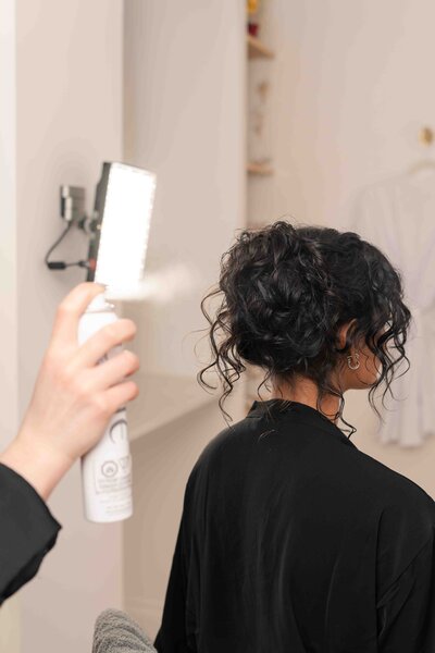 women getting hair styled