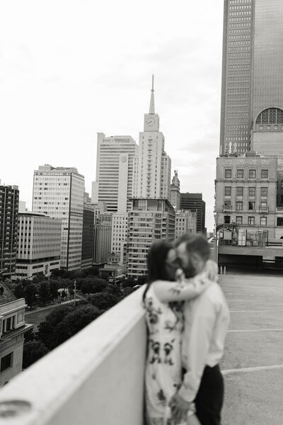 engagement photos on couple on rooftop