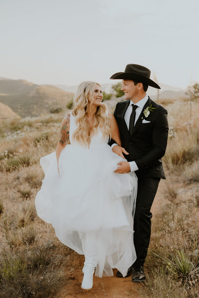 Bride and Groom in cowboy hat and cowboots