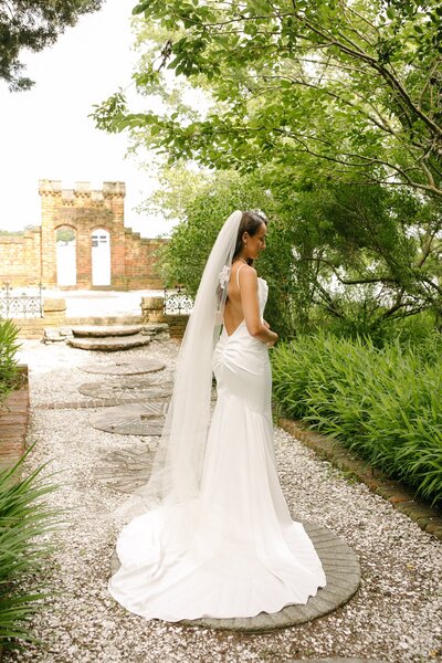 Bride standing at a park posing