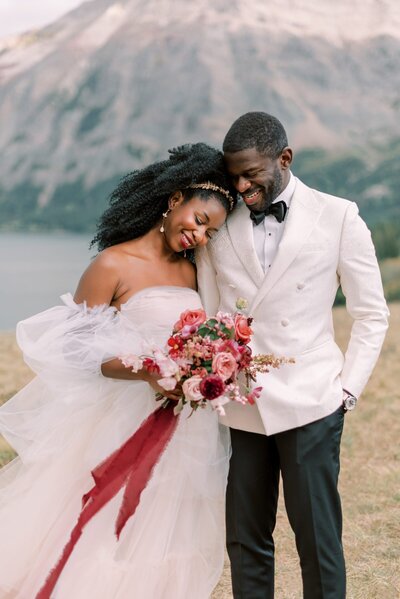Sweet and sophisticated Waterton Elopement with rich tones of Merlot + Berry captured by Kaity Body Photography, elegant film inspired wedding photographer in Calgary, Alberta. Featured on the Bronte Bride Blog.