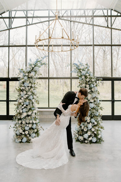 Indoor ceremony kiss by Carmel wedding photographer


