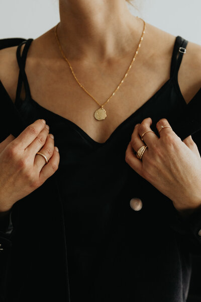 kaboompics_jewelry-photo-shoot-woman-wearing-gold-rings-and-necklace-29195