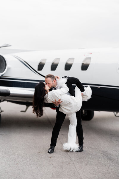 Groom kissing bride on forehead at Crimson Lane Wedding Venue in Ada Ohio