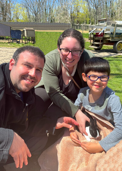 family at farm, petting baby bunny, holding baby bunnies, farm long island, finding a family to adopt my baby, accidentally pregnant, adoption agencies near me, adoption new york, baby adoption long island, open adoption, giving up my baby