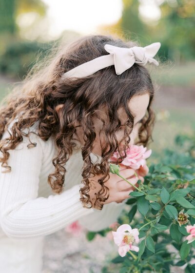 Toddler girl photoshoot at rose garden in Dallas Texas