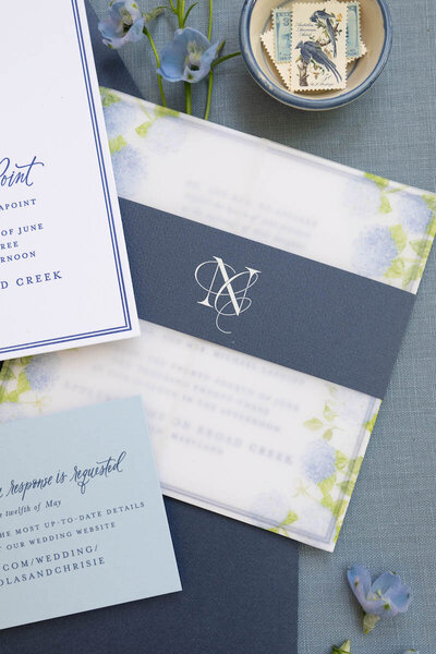 Light and airy wedding invitation suite with custom calligraphy