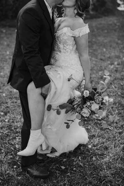 couple doing a dip and kissing