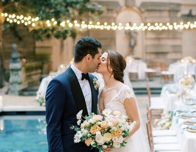 Groom giving the bride a kiss