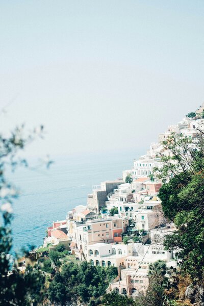 Colorful hillside buildings overlooking the sea in Positano, Amalfi Coast