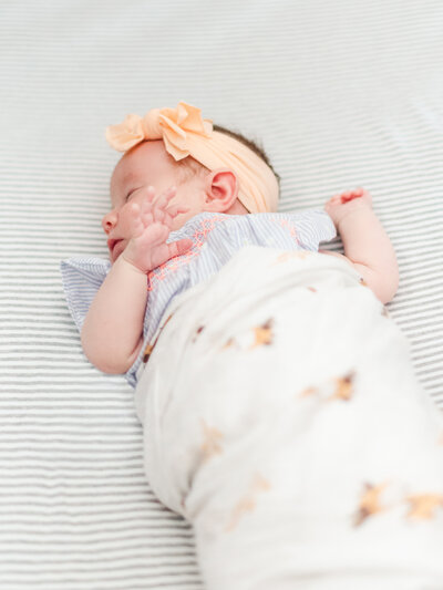 Picture of newborn baby girl with pink headband