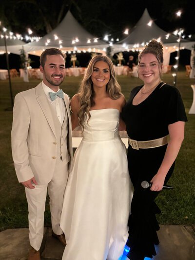 a singer with the bride and groom