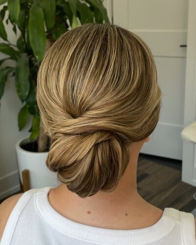Blonde twisted low bun hairstyle