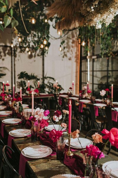 Pink and red wedding tablescape