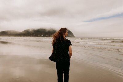 Portrait of man looking out over the Oregon Coast  at Cannon Beach