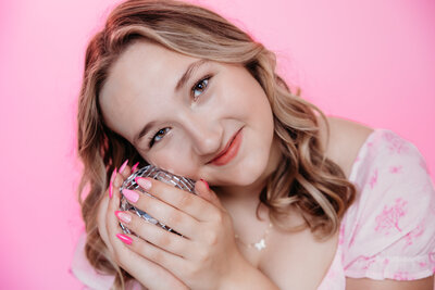 girl-holding-small-mirror-ball