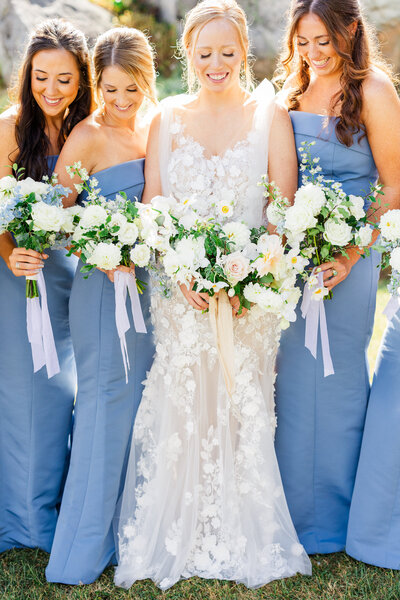 blue bridesmaids dresses at a cliffs at glassy chapel wedding