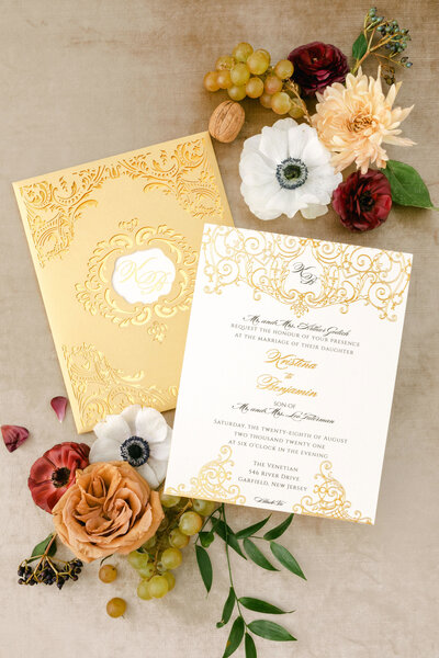 Laser cut invitation with gold foil 