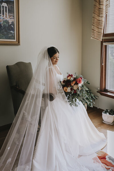 a bride holding a flower bouquet
