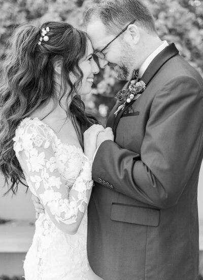 bride and groom hugging