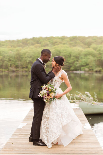 Bride and groom in field at Colorado wedding