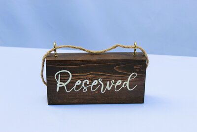 hanging reserved sign
