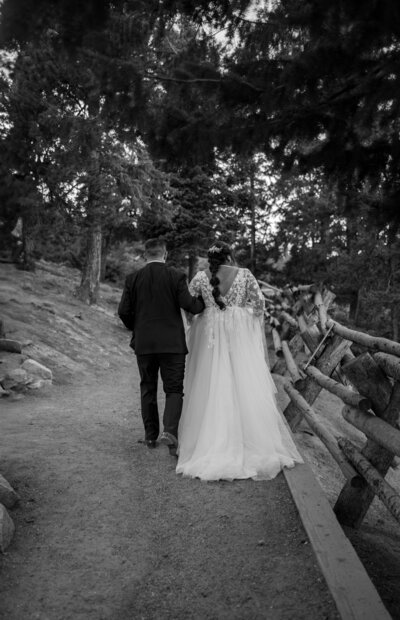 Couple walking towards the camera in Rocky Mountain National Park