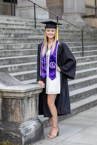 girl in cap and gown university of washington