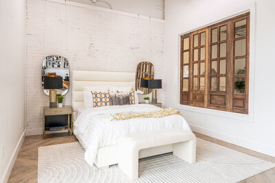 White bed with gold accents