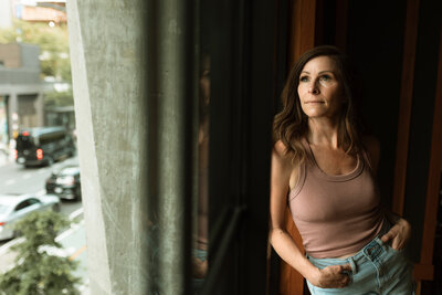 Natural light branding portrait of Shannon Kathleen in Minneapolis, reflecting confidence and transformation.