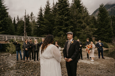 Exchanging of vows during intimate elopement in Washington.