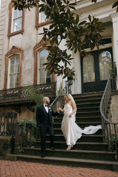 Intimate wedding photographer in Birmingham Alabama documents a couple eating cake intimately after they tie the knot at the courthouse