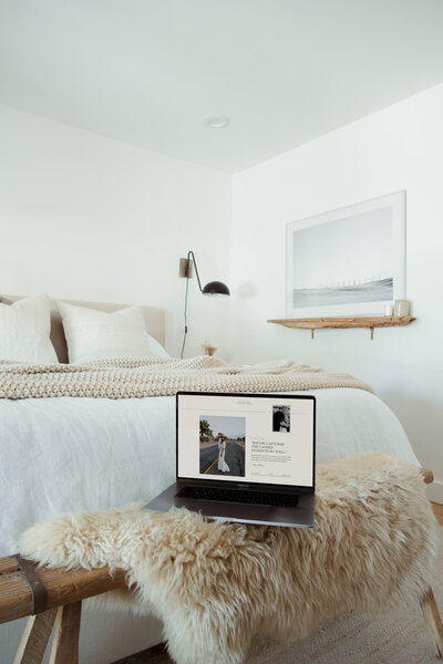 Laptop mockup showing showit web design for luxury photographers, Palme Design Co
