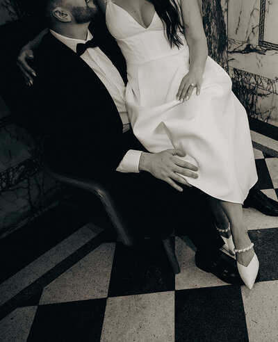 Couple Kissing in front of a mirror at Heinz Hall Engagement