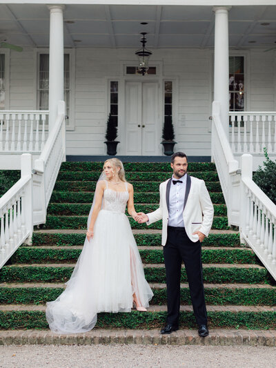 Couple of Old Wide Awake wedding venue stairs in Charleston