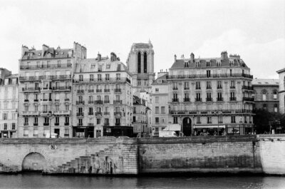 black and white paris print of notre dame and the seine river
