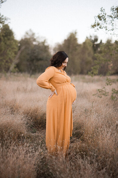 pregnant woman in field