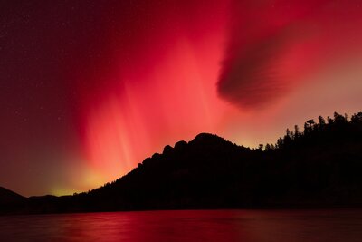 Northern lights glowing over Rocky Mountain National Park