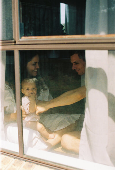 A candid family moment during a photoshoot in a beautifully restored Brunswick home in Melbourne.