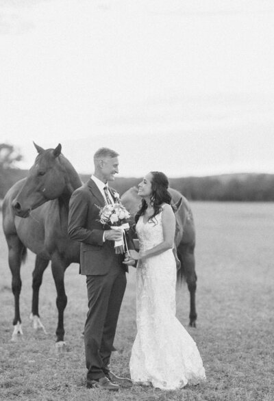 groom embracing bride