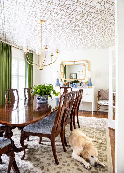 Classic timeless dining room design with patterned curtains