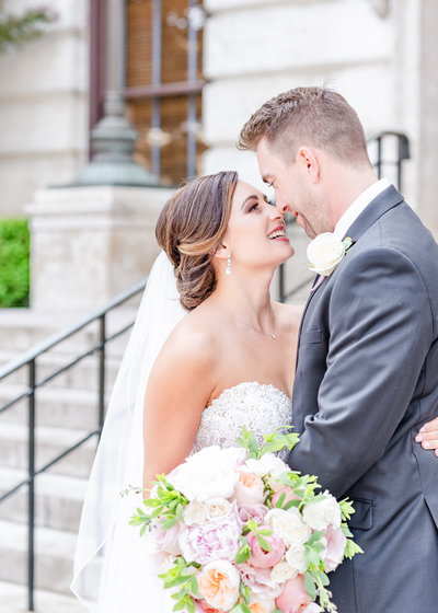 Bride and groom, spring pink wedding portraits