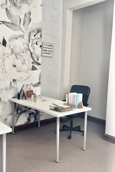 woman sitting at desk working