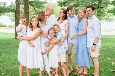 family wearing a mix of blue and white during their extended family session