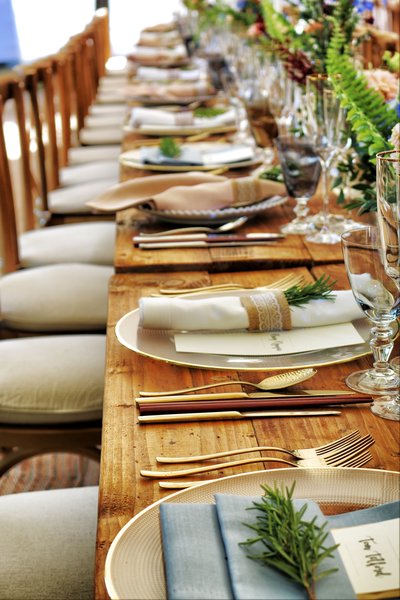 a banquet hall with a large oak dinner table