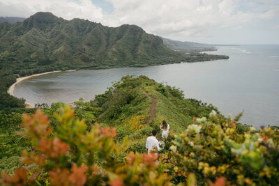 Oahu elopement photographer capturing a bride and groom at sunset