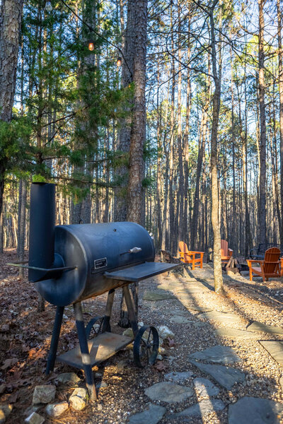 Fire pit with barbecue grill at cabin near Wolf Pen Gap in the Ouachita National Forest